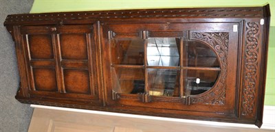 Lot 1349 - A corner cupboard