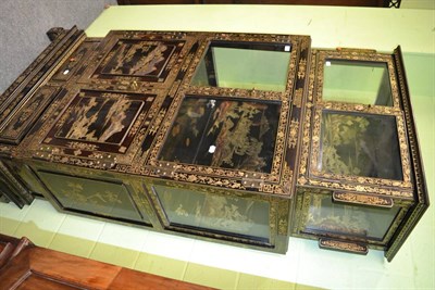 Lot 1351 - A Chinese ebonised glazed top cabinet with gilt decoration