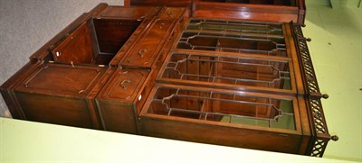 Lot 1352 - A reproduction glazed bookcase cabinet with secretaire forefront