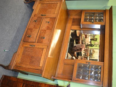 Lot 1356 - An early 20th century oak mirror backed sideboard