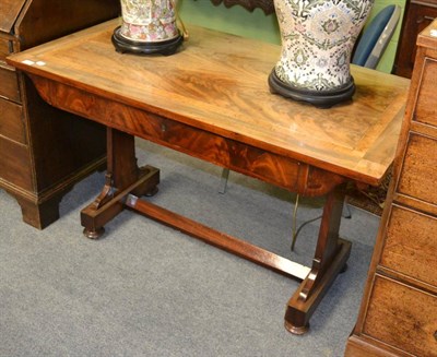 Lot 1362 - A Regency library table in faded mahogany with single drawer, with key