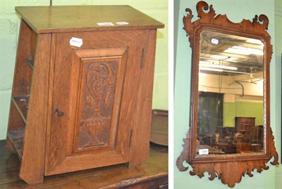 Lot 1366 - An early 20th century carved oak smoker's cabinet and a span class="description" title="George...