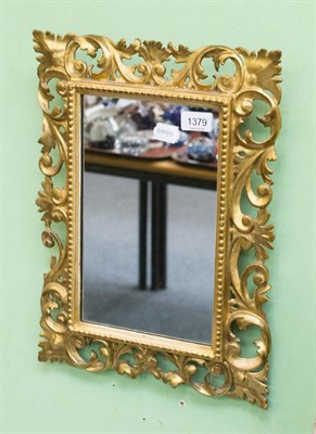 Lot 1379 - A 19th century gilt florentine mirror