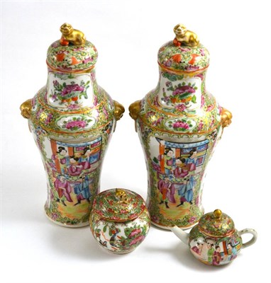 Lot 22 - A group of 18th/19th century Canton famille rose including a pair of vases, miniature teapot...