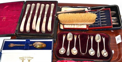 Lot 23 - Six cased silver sets including enamelled crown tooth picks with silver backed brush and comb (qty)