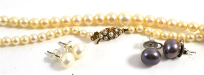Lot 70 - A cultured pearl necklace, with split pearl set clasp and two pairs of cultured pearl stud earrings