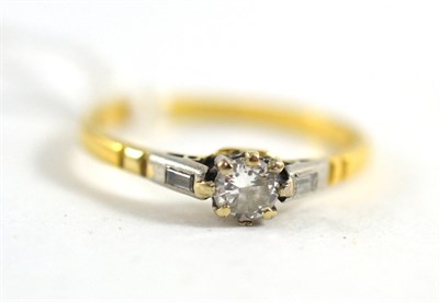 Lot 82 - A diamond three stone ring (worn) principal diamond weight 0.20 carat approximately