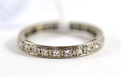 Lot 83 - A diamond full eternity ring (a.f.)