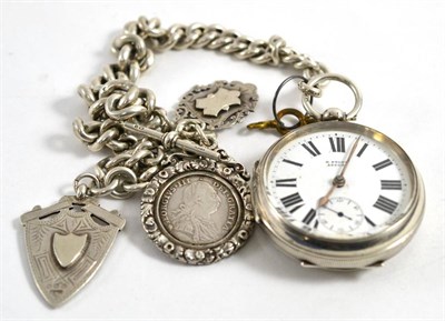 Lot 92 - An Edwardian silver pocket watch Chester, 1900 with a heavy curb-link silver chain hung with...