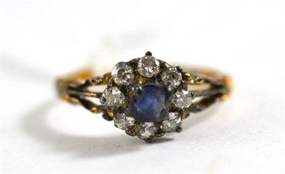 Lot 109 - Sapphire and diamond cluster ring, 0.40 carat total estimated diamond weight