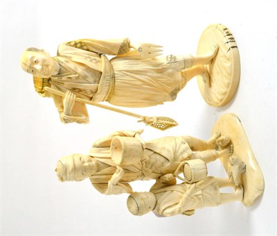 Lot 121 - A Japanese ivory Okimono, Meiji period, fish seller, together with another man and boy of...