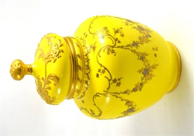 Lot 128 - A Royal Crown Derby jar and cover with a yellow ground