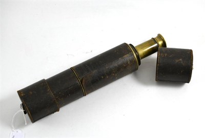 Lot 132 - An early 20th century three draw brass telescope with leather sleeve