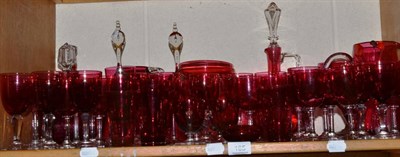 Lot 165 - A group of cranberry glass including decanters, jug, drinking glasses etc