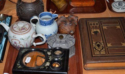 Lot 197 - A Chinese export porcelain teapot, three pieces of ceramics, a lead tobacco box, a gilt tooled...