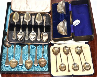 Lot 198 - A cased set of silver coffee spoons, two cased sets of silver teaspoons and a cased pair of...