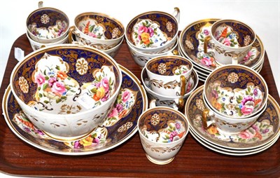 Lot 205 - A collection of 19th century tea wares decorated with floral sprays and highlighted in gilt