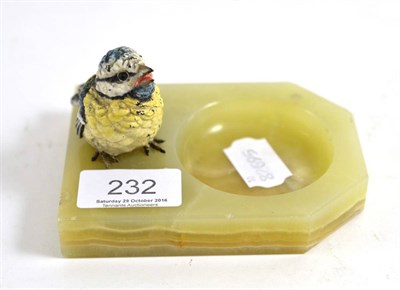 Lot 232 - An onyx ashtray mounted with cold painted bronze bird