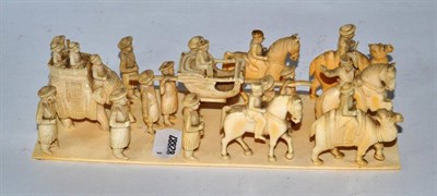 Lot 235 - An early 20th century Indian ivory group