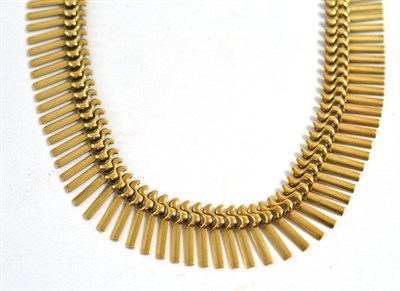 Lot 274 - A fringe necklace, stamped '375'