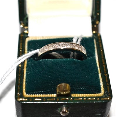 Lot 291 - An 18ct white gold princess cut diamond half hoop ring, 0.66 carat approximately