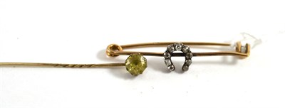 Lot 309 - An old cut diamond horse shoe bar brooch and a stick pin