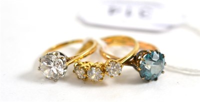 Lot 314 - A blue zircon ring and two 9ct gold cubic zirconia set rings (3)