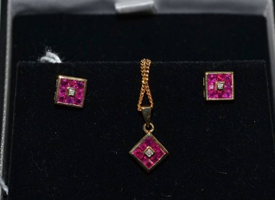 Lot 320 - A ruby and diamond set square pendant on a fine chain together with a matching pair of stud...