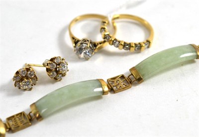 Lot 322 - A 9ct gold jade bracelet with Chinese character links, a 9ct gold solitaire cubic zirconia...