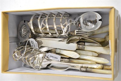 Lot 327 - Various plated spoons and flat wares with two plated toast racks and two plated mustards (qty)