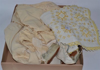 Lot 346 - A cream wool baby cape, embroidered table runner, pair of pale blue embroidered baby boots and pair