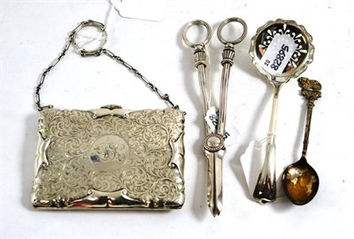 Lot 373 - A silver sifter spoon, plated grape scissors, silver purse