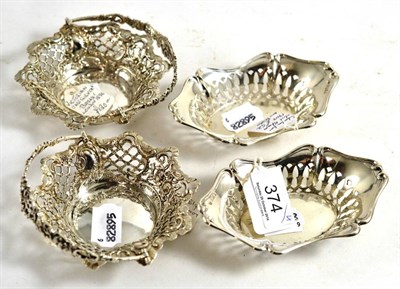 Lot 374 - A pair of Victorian small silver baskets and a pair of silver bonbon dishes