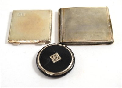 Lot 389 - Two silver powder compacts together with a silver mounted example (3)