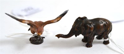 Lot 392 - A cold painted model of an eagle and a bronze model of an elephant (2)