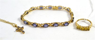 Lot 393 - A 9ct gold tanzanite set bracelet, a 9ct gold tanzanite set cross pendant, on fine chain and a...