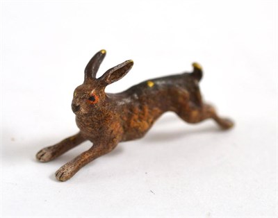 Lot 403 - A cold painted bronze model of a running hare