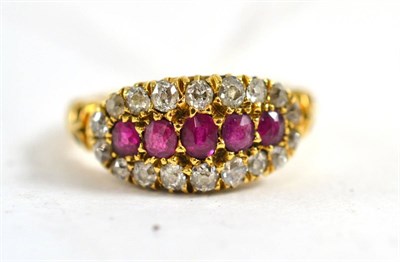 Lot 404 - An 18ct gold old cut diamond and ruby ring