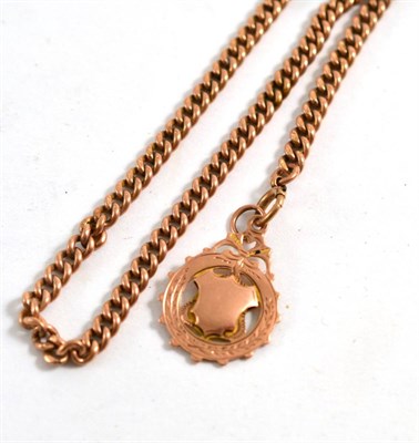 Lot 408 - 9ct rose gold albert, with 9ct gold medallion