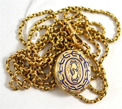 Lot 437 - An enamelled locket on a guard chain, stamped