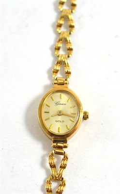 Lot 468 - A Geneve 'Gold' 9ct gold cased quartz wristwatch, on 9ct gold bracelet