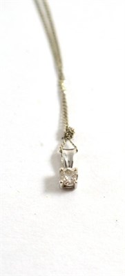 Lot 478 - A 9ct white gold diamond solitaire pendant on chain, 0.15 carat approximately