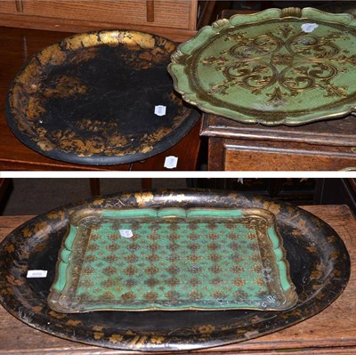 Lot 486 - A 19th century oval toleware tray, a papier mache example of similar date and two other similar