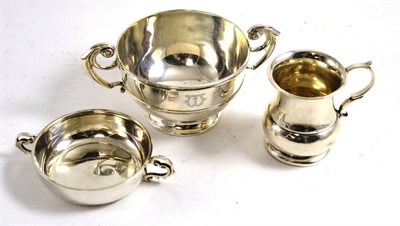 Lot 495 - A silver loving cup, silver christening mug, a silver Quaich