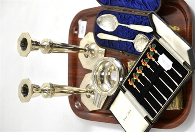 Lot 498 - Silver comprising circular ash dish with Celtic border, pair of loaded candlesticks, two cased sets