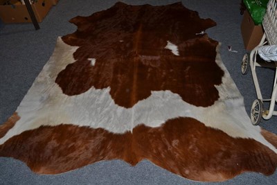 Lot 1029 - Nguni Cow Hide (Bos taurus), modern excellent quality AA grade brown and white cow hide floor...