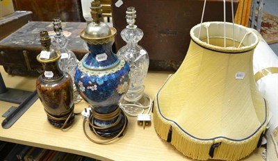 Lot 1111 - Two Cloisonne lamps and three cut glass table lamps together with small Chinese rug and a...