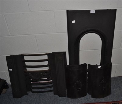 Lot 1126 - Three various cast iron fire places