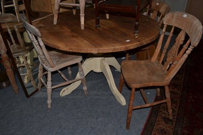 Lot 1128 - Pine circular pedestal kitchen table, set of four kitchen chairs and one other (6)