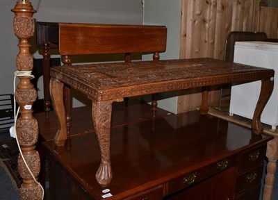 Lot 1131 - Indian walnut carved low table and matching standard lamp